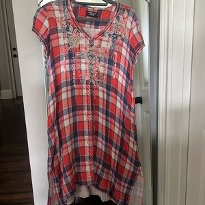 Johnny was dressed with side, slits and embroidery